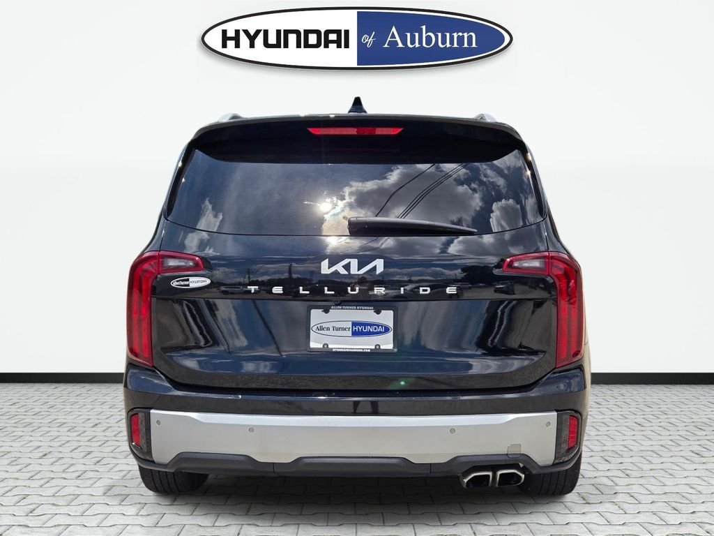 Used 2025 Black Kia S image 6