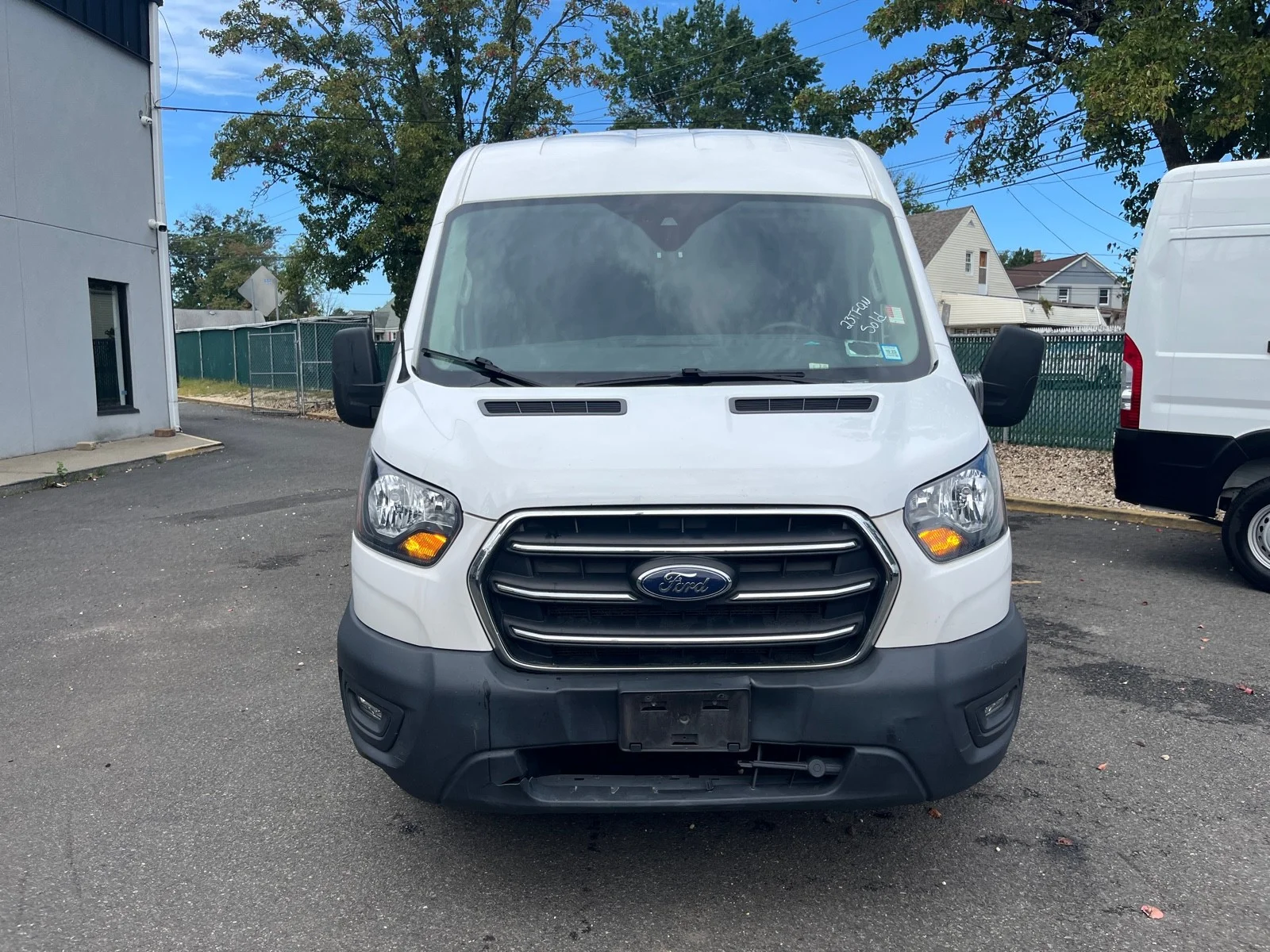 Used 2020 Oxford White Ford T250 MED ROOF image 2