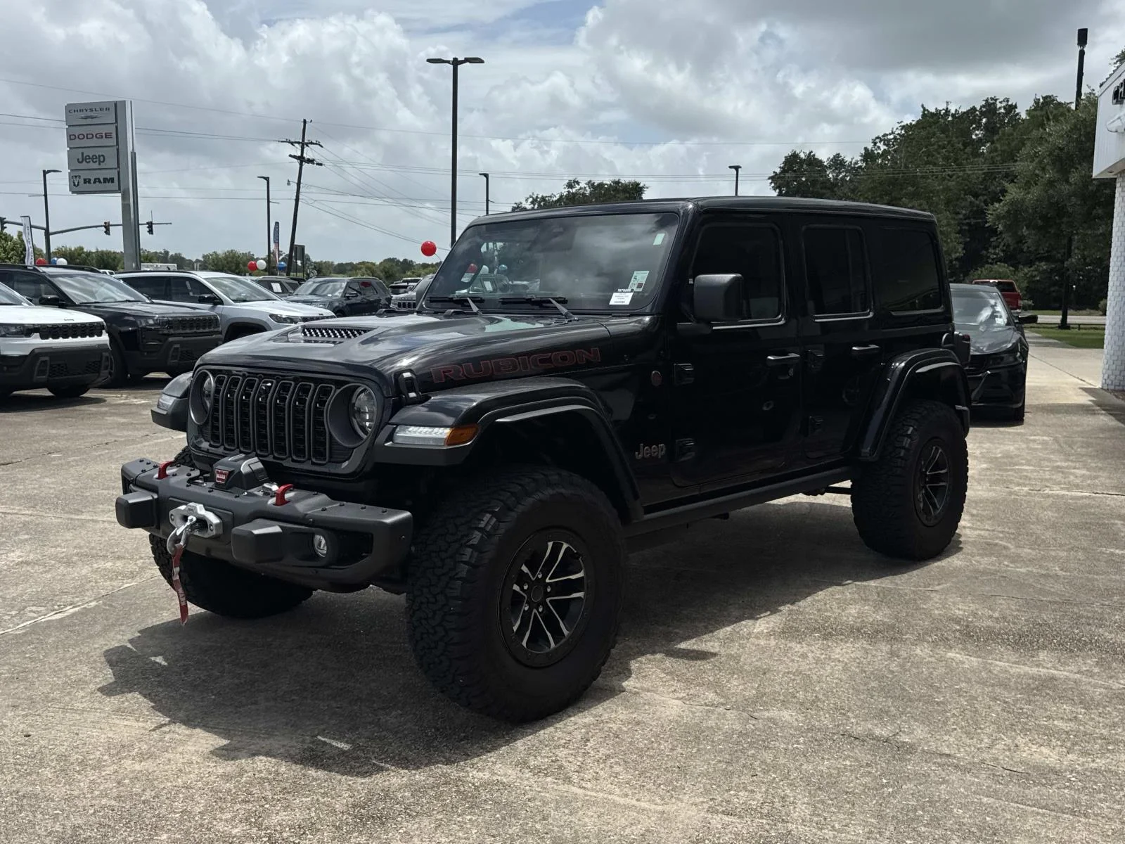 Used 2026 BLACK CLEARCOAT Jeep Rubicon X image 3