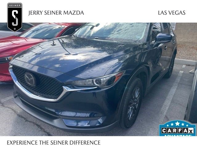 Used 2019 Deep Crystal Blue Mica Mazda Touring image 1