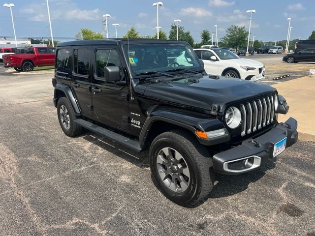 Used 2021 Black Jeep Unlimited Sahara image 1