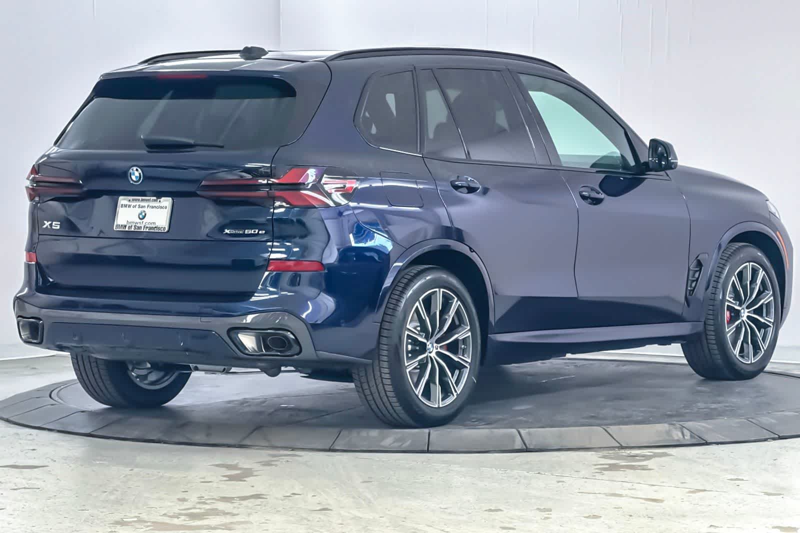 New 2026 Tanzanite Blue II Metallic BMW xDrive50e image 2