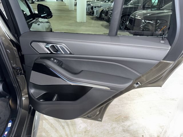 New 2026 Manhattan Green Metallic BMW xDrive50e image 10