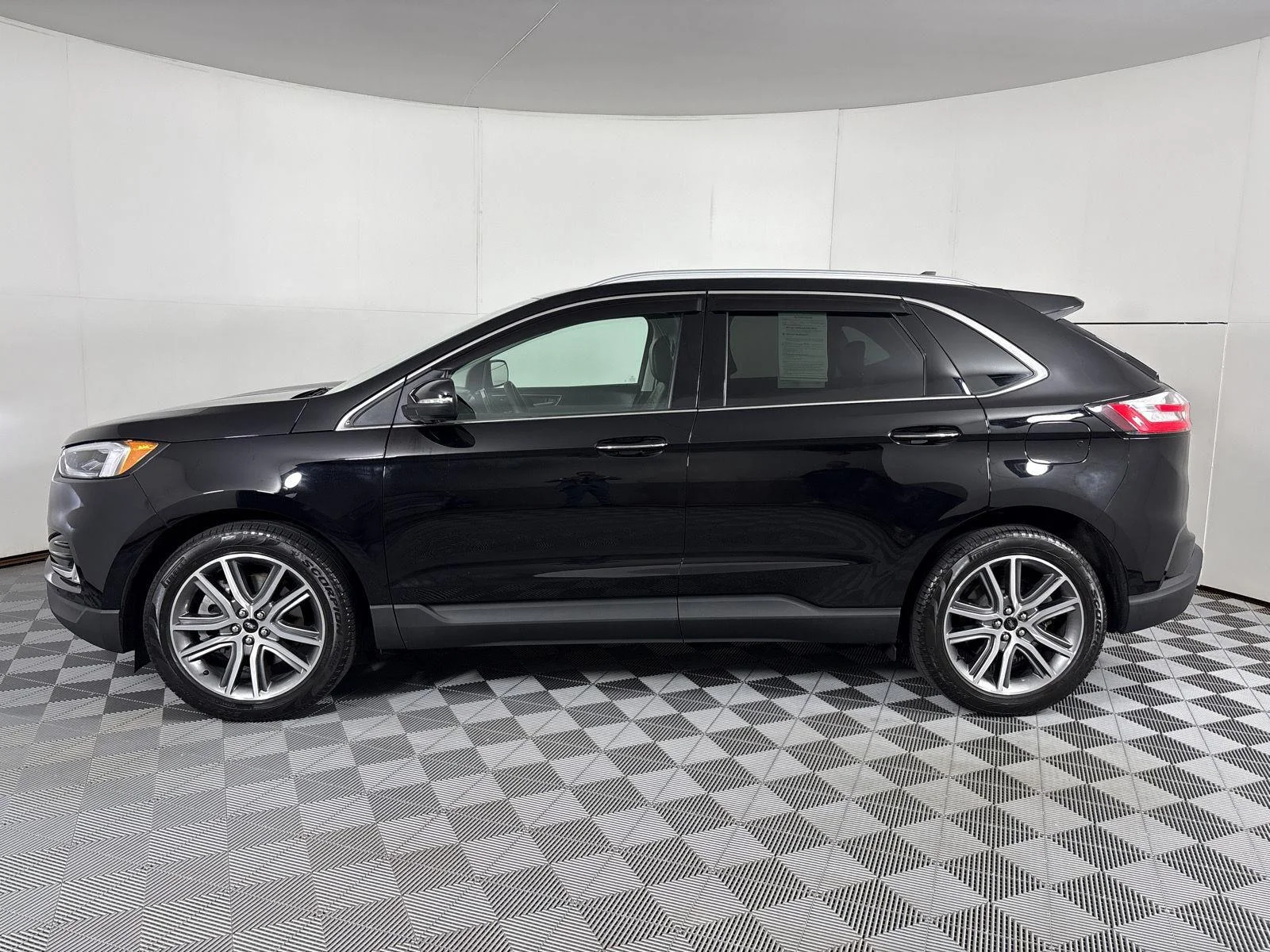 Used 2024 Agate Black Metallic Ford Titanium image 16