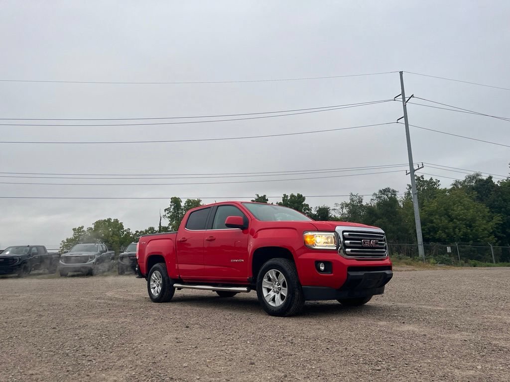 Used 2016 CARDINAL RED GMC 4WD SLE image 7