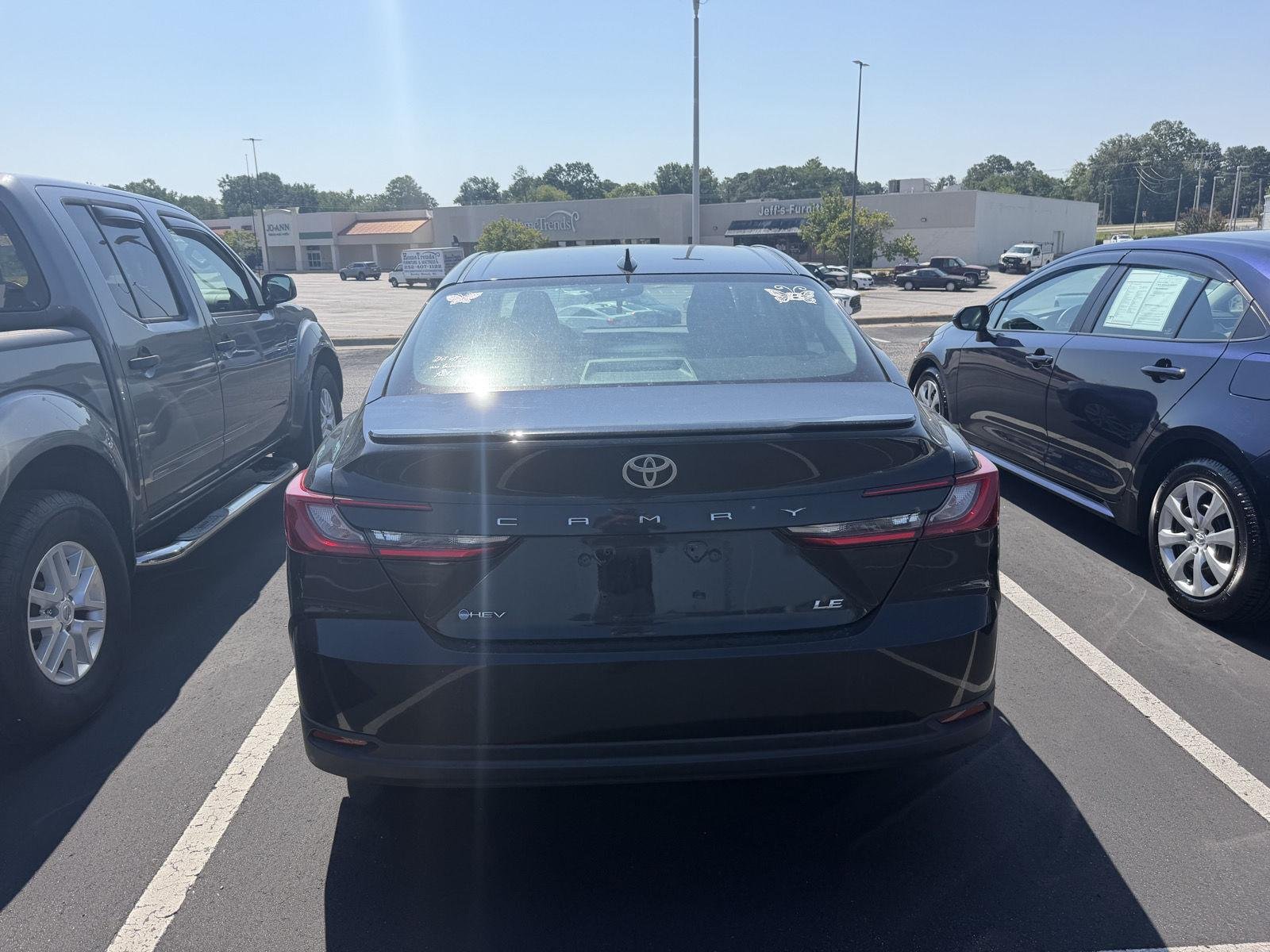 Used 2025 Midnight Black Metallic Toyota LE image 5
