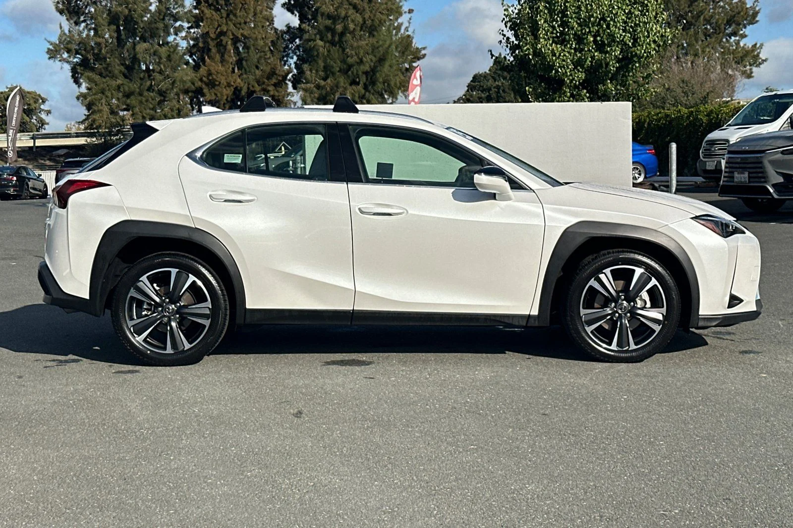 Certified Used 2025 White Pearl Lexus 300h image 3