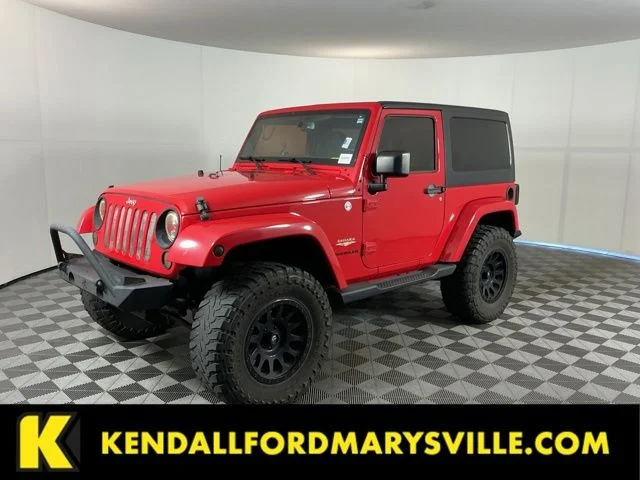 Used 2015 Red Jeep Sahara image 1