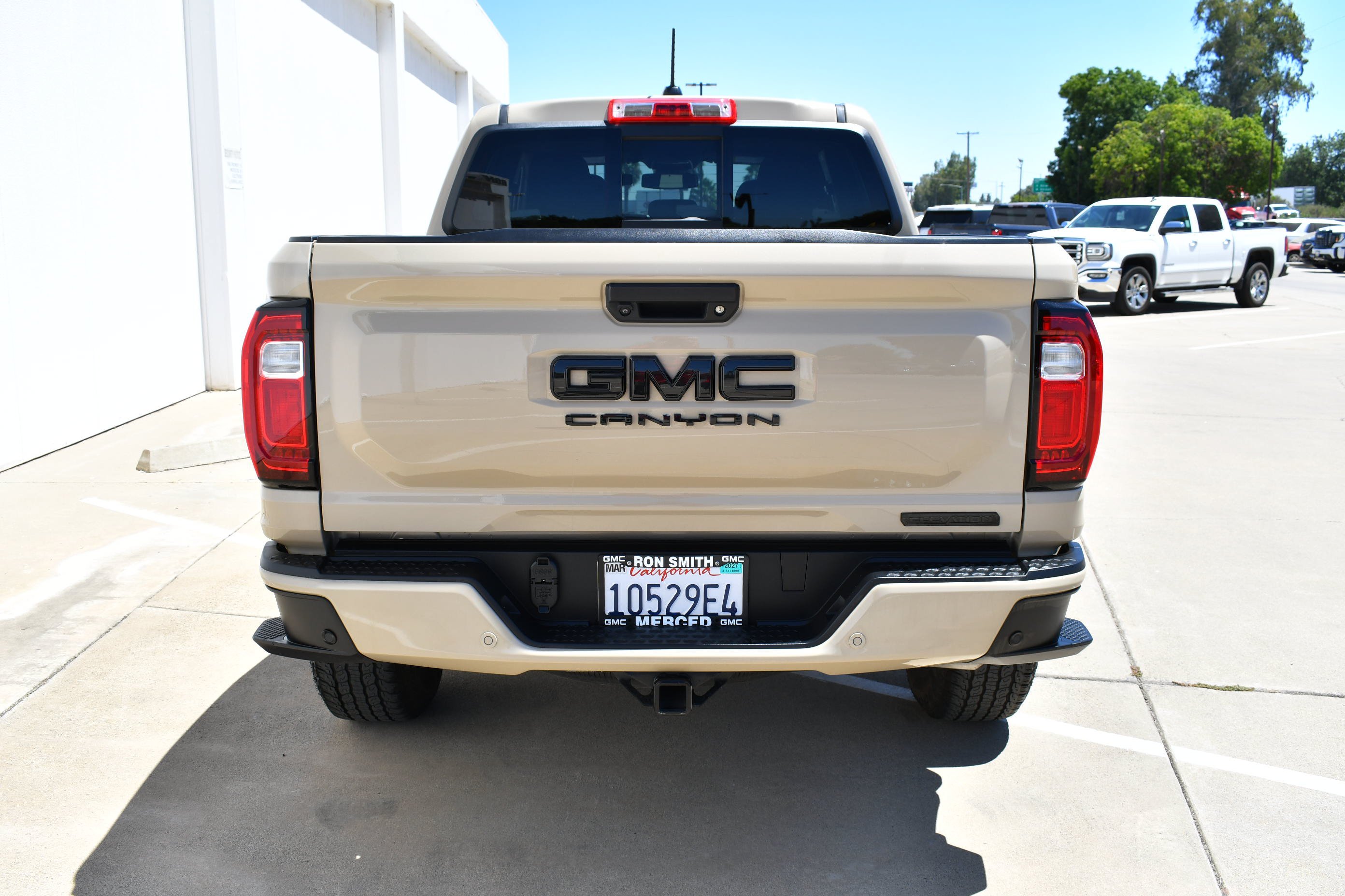 Used 2024 Desert Sand Metallic GMC Elevation image 7
