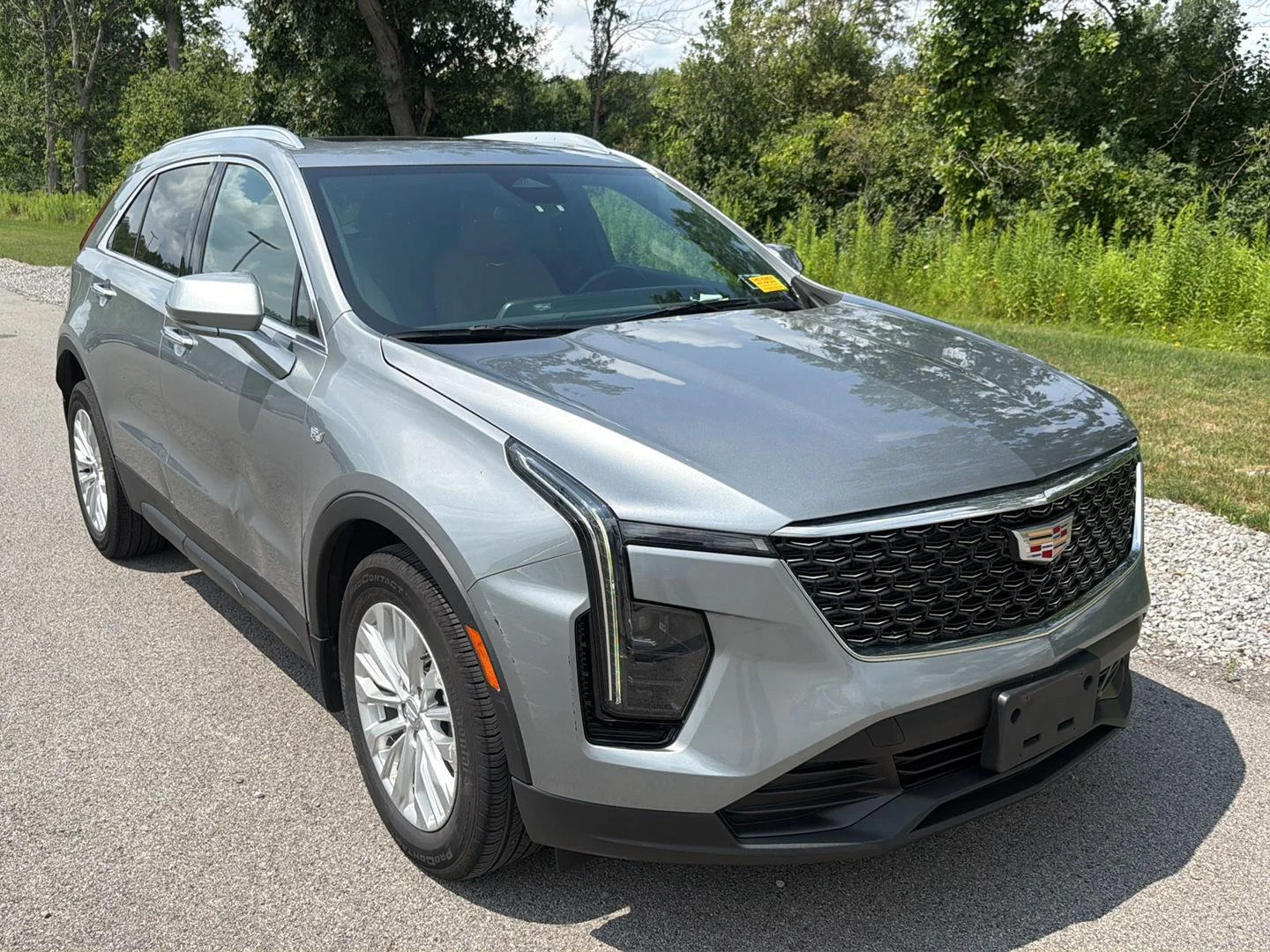 Used 2024 Argent Silver Metallic Cadillac AWD Luxury image 2