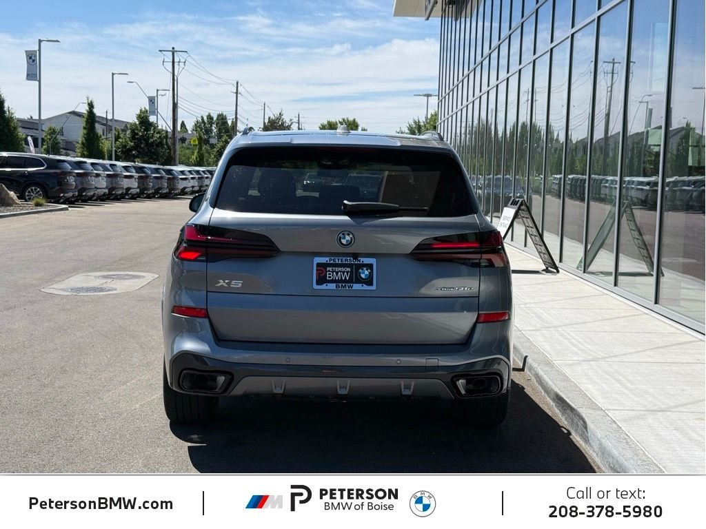 New 2026 Skyscraper Grey Metallic BMW xDrive50e image 4