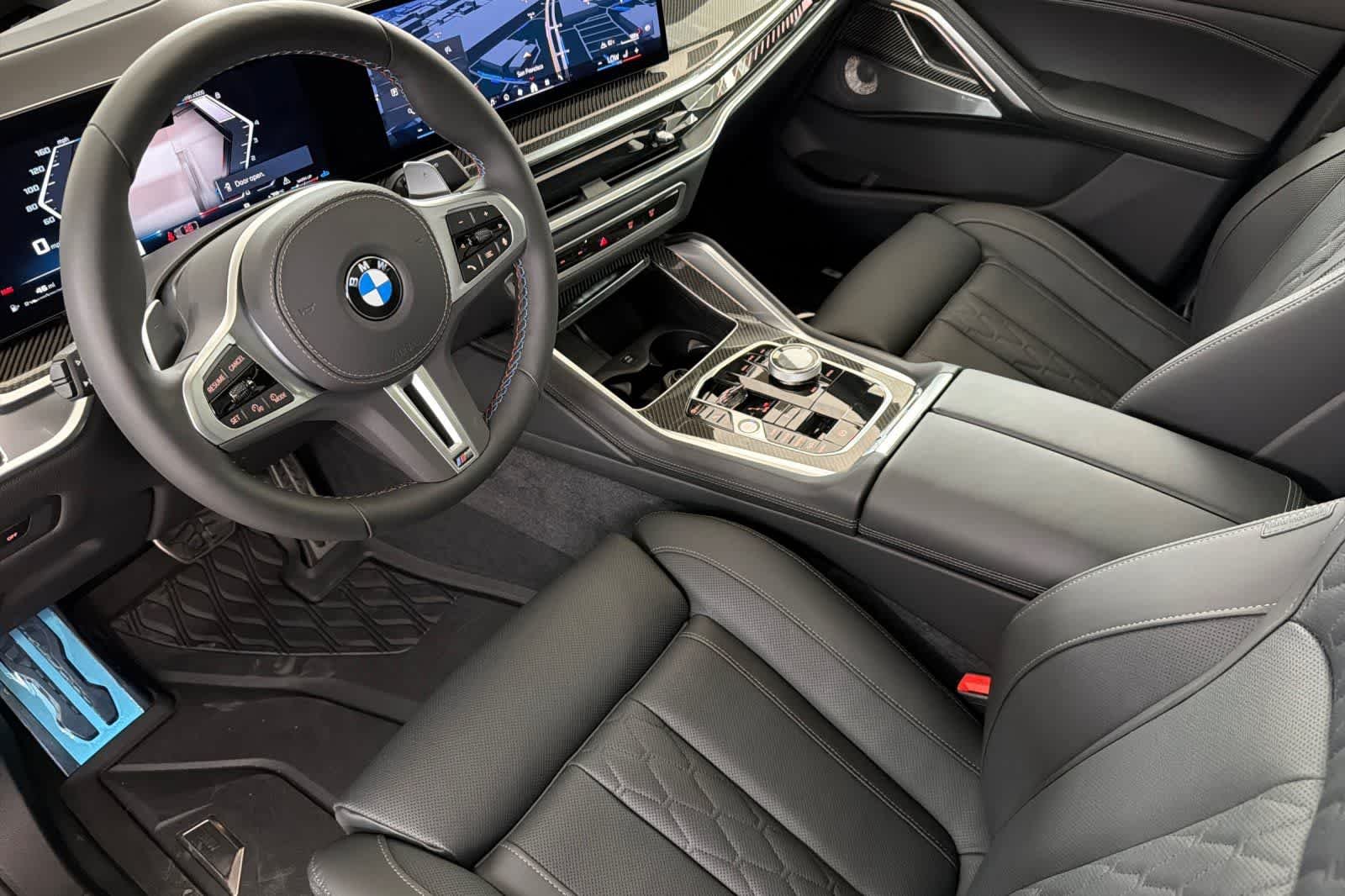 New 2026 Black Sapphire Metallic BMW M60i image 11