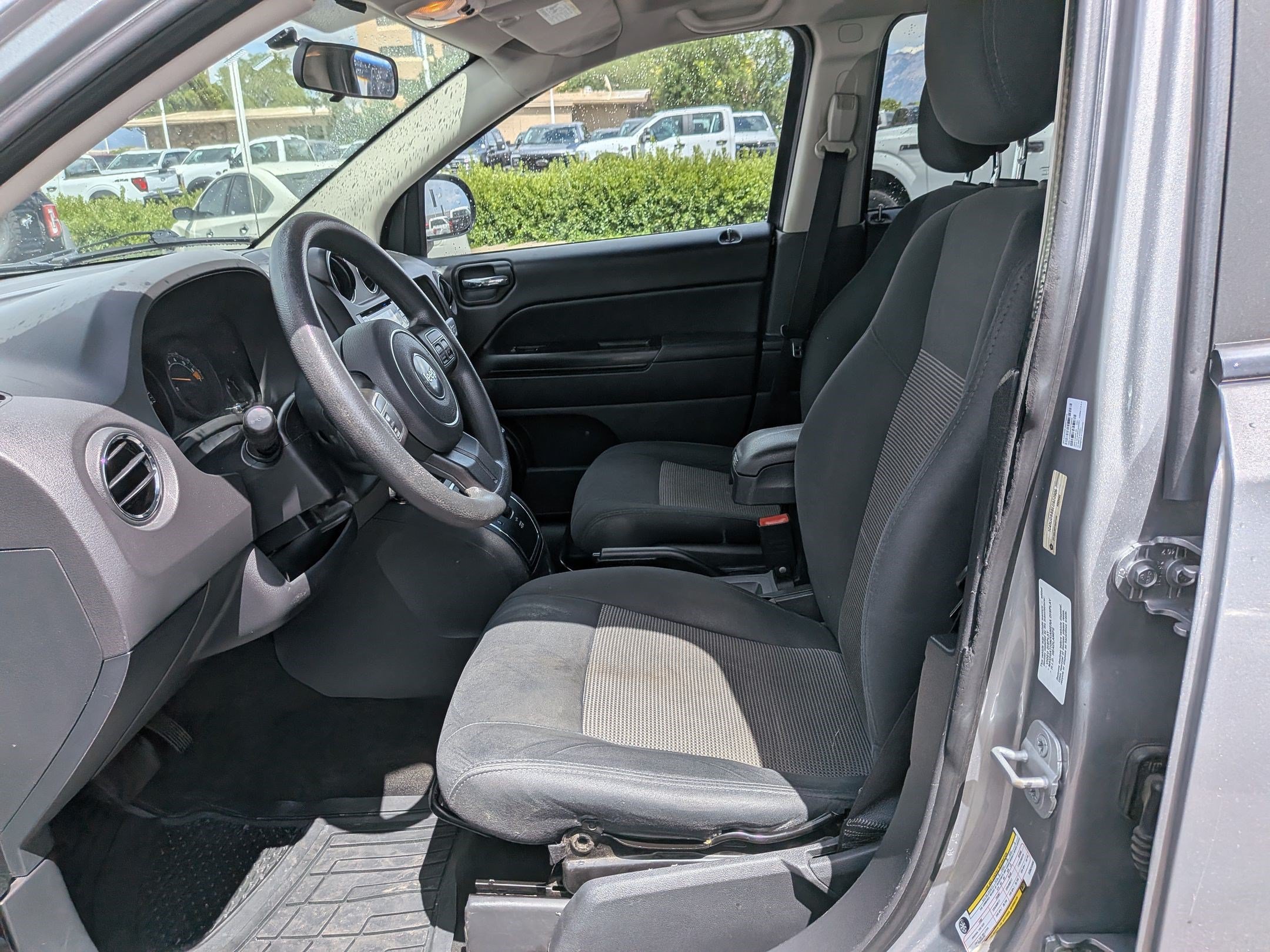 Used 2014 Billet Silver Clearcoat Metallic Jeep Sport image 23