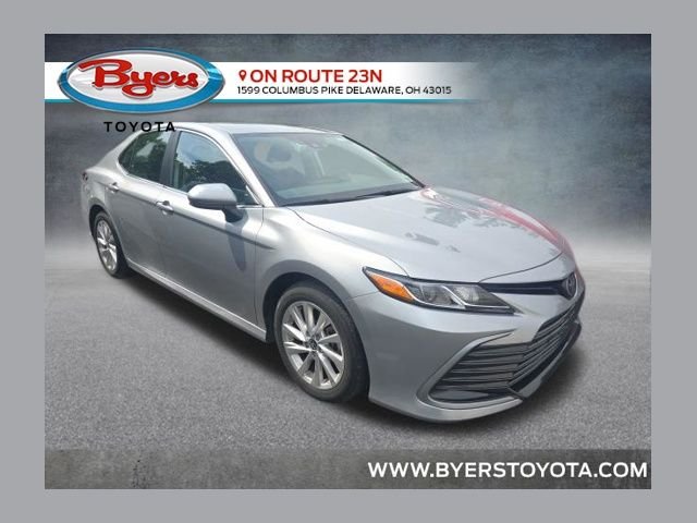 Used 2024 Celestial Silver Metallic Toyota LE image 1