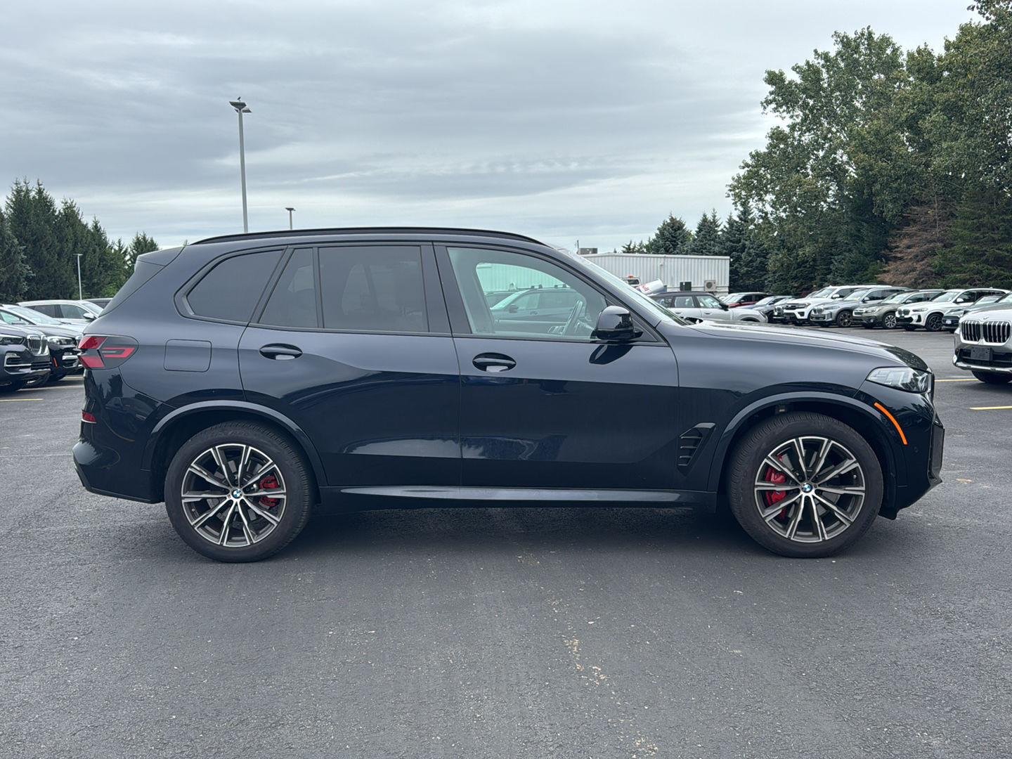 Used 2025 Carbon Black Metallic BMW xDrive40i image 2