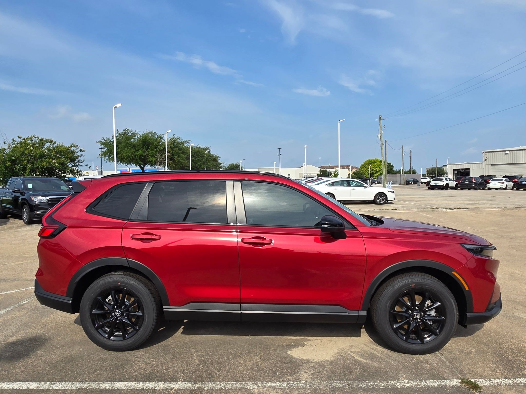 New 2026 Radiant Red Metallic Honda Sport image 2