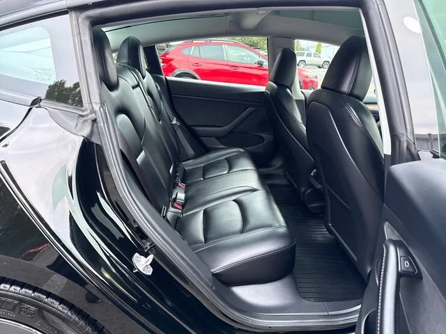Used 2023 Solid Black Tesla Base image 10