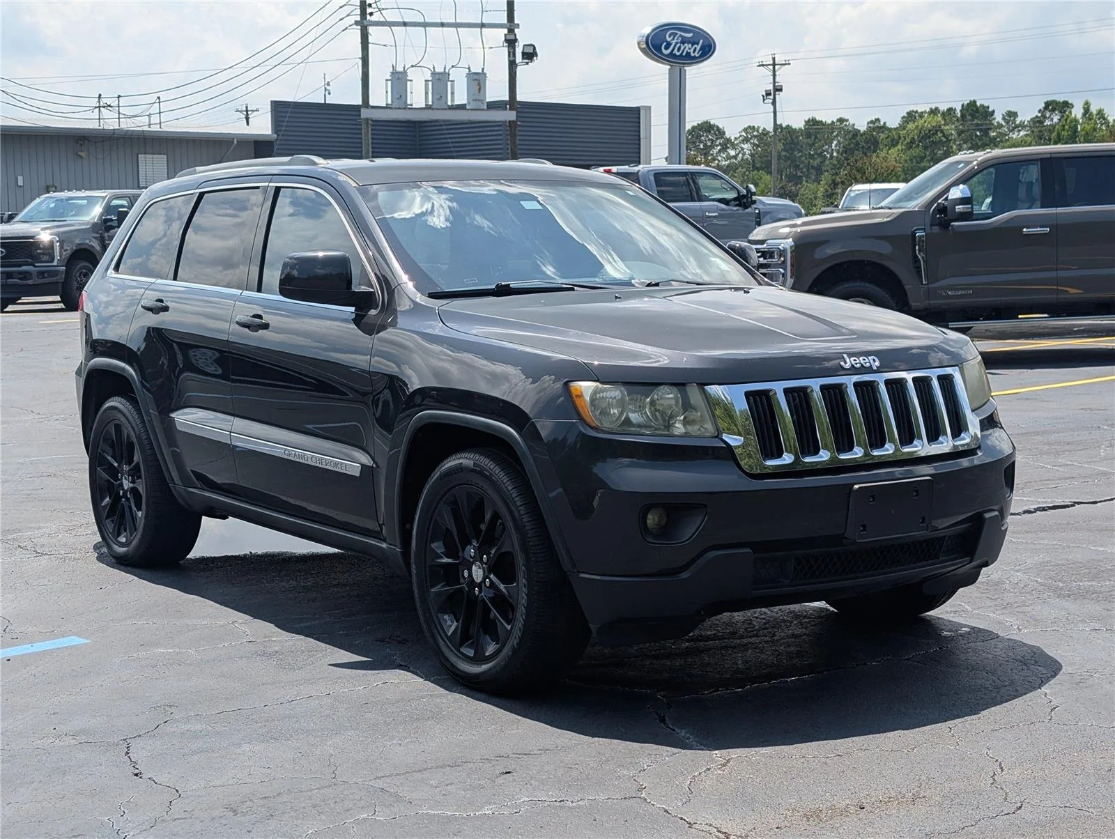 Used 2011 Black Jeep Laredo 2WD image 7