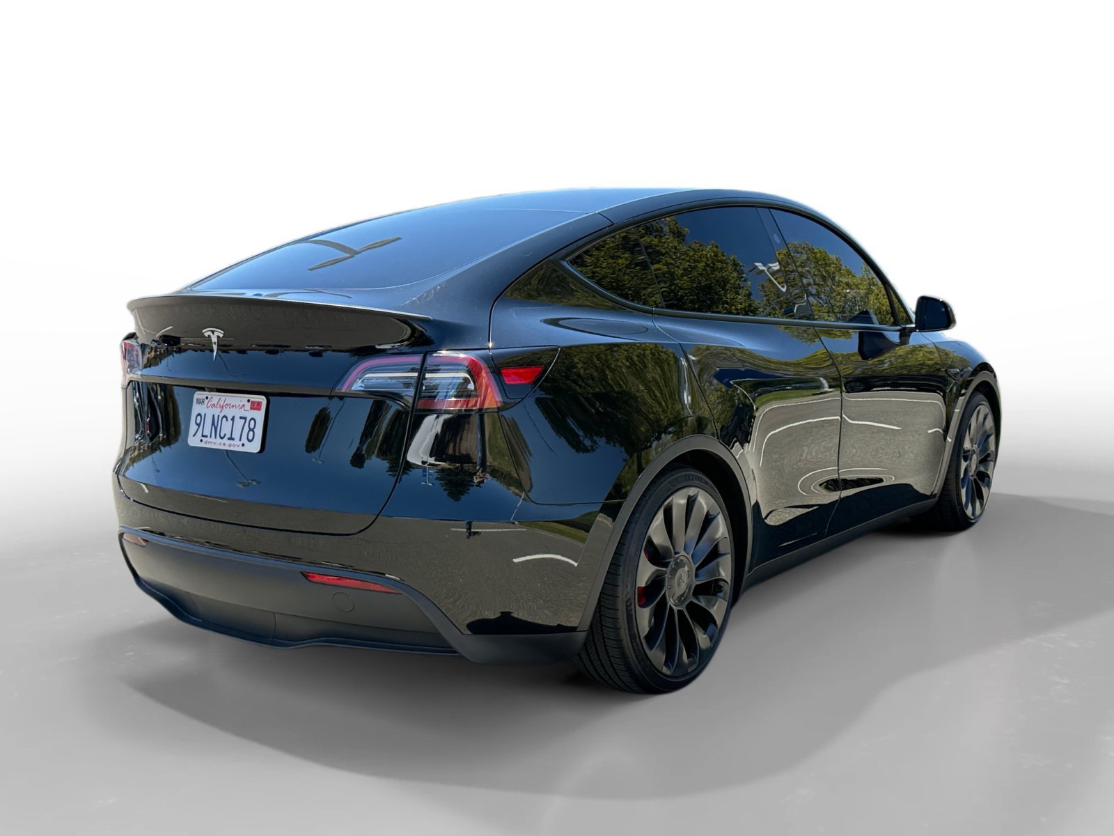 Used 2024 Solid Black Tesla Performance image 5