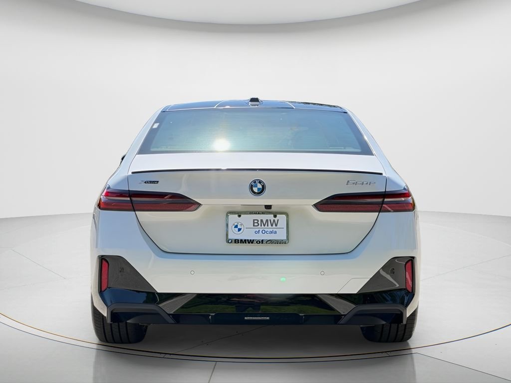 New 2027 Mineral White Metallic BMW 550e xDrive image 6