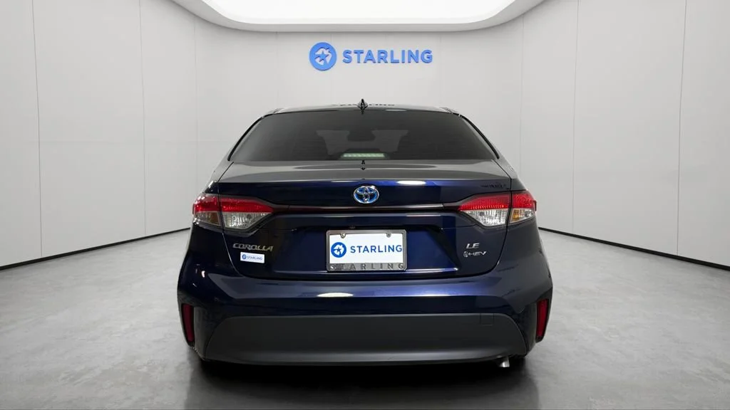 Used 2025 Blue Toyota Hybrid LE image 8