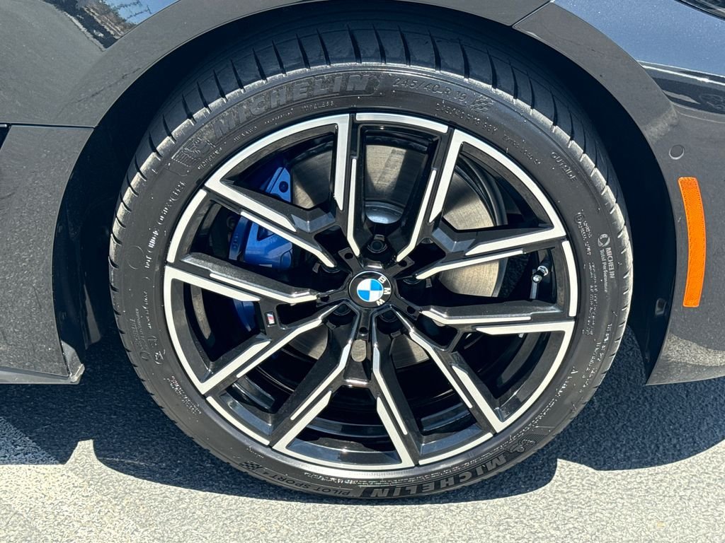 Used 2025 Black Sapphire Metallic BMW eDrive40 image 11