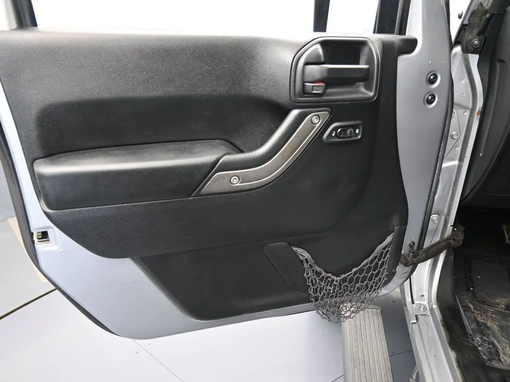 Used 2016 Billet Silver Metallic Clearcoat Jeep Unlimited Sport image 12