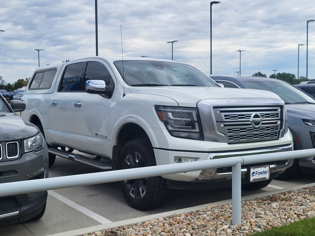 Used 2021 White Nissan Crew Cab Platinum Reserve 4x4 image 1