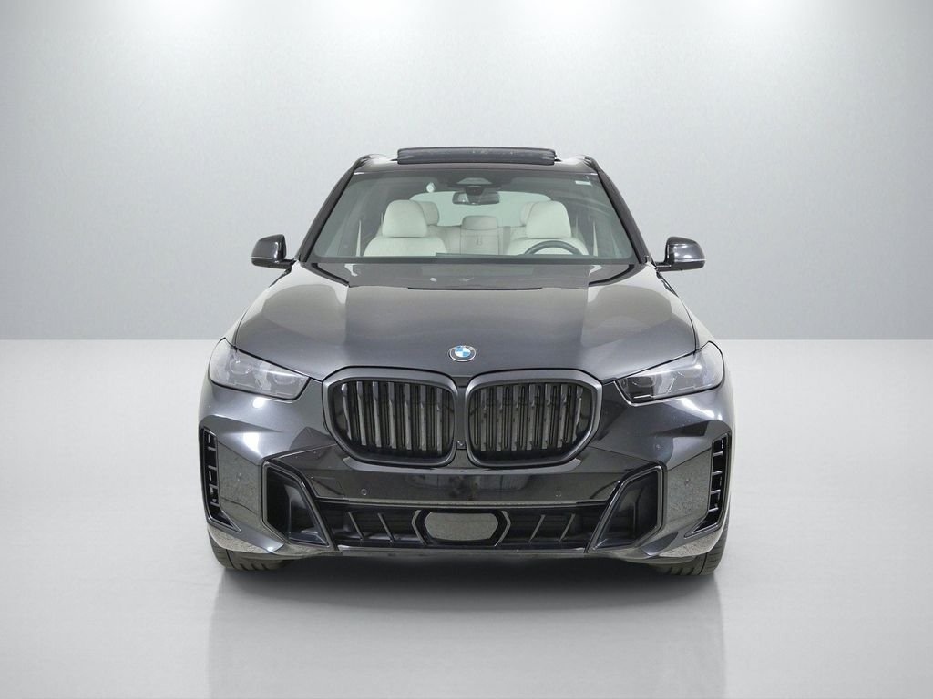Certified Used 2025 Black Sapphire Metallic BMW xDrive40i image 3