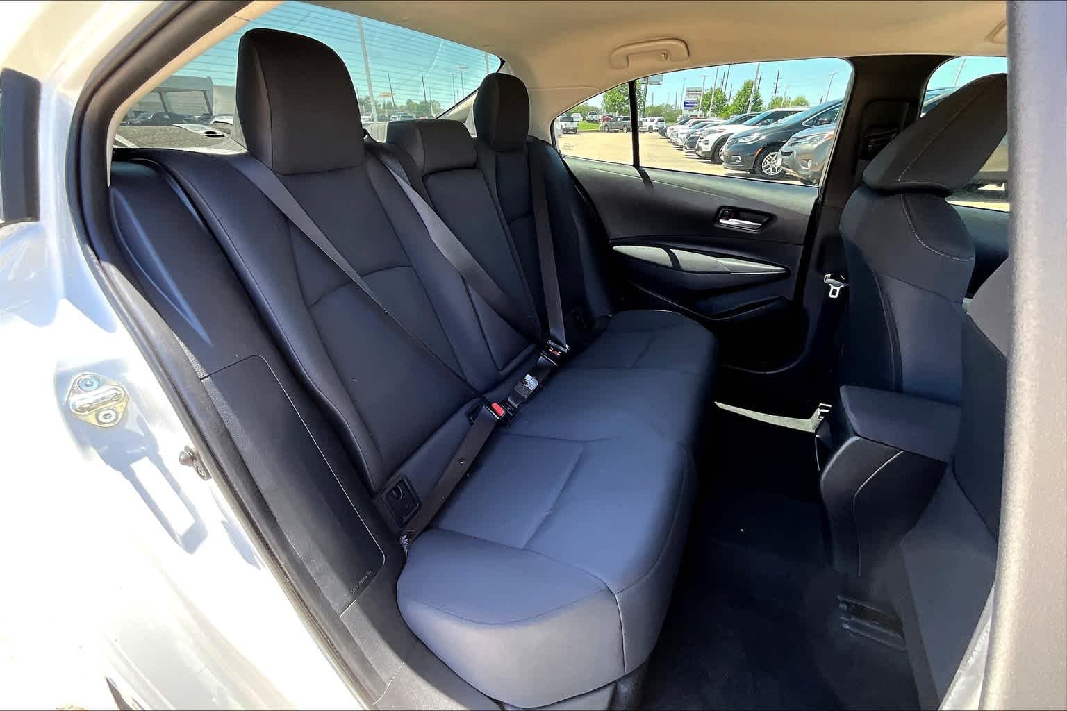 Used 2021 Super White Toyota LE image 21