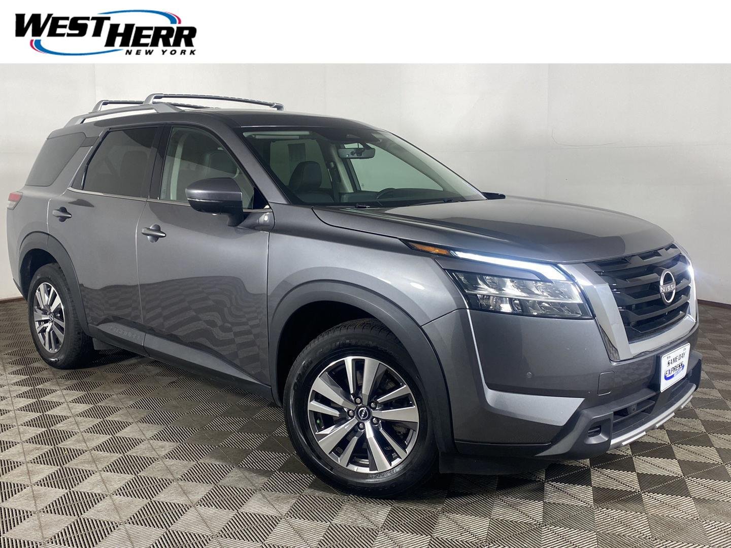 Used 2023 Gun Metallic Nissan SL 4WD image 1