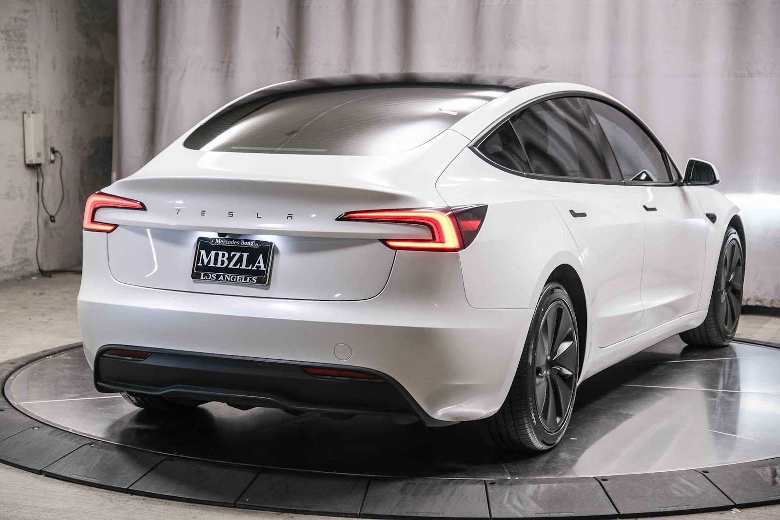 Used 2024 Pearl White Multi-Coat Tesla  image 4