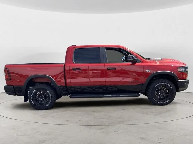 New 2026 Molten Red Ram REBEL CREW CAB 4X4 5