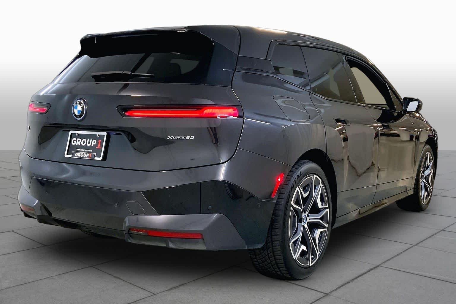 Certified Used 2024 Dark Graphite Metallic BMW xDrive50 image 12