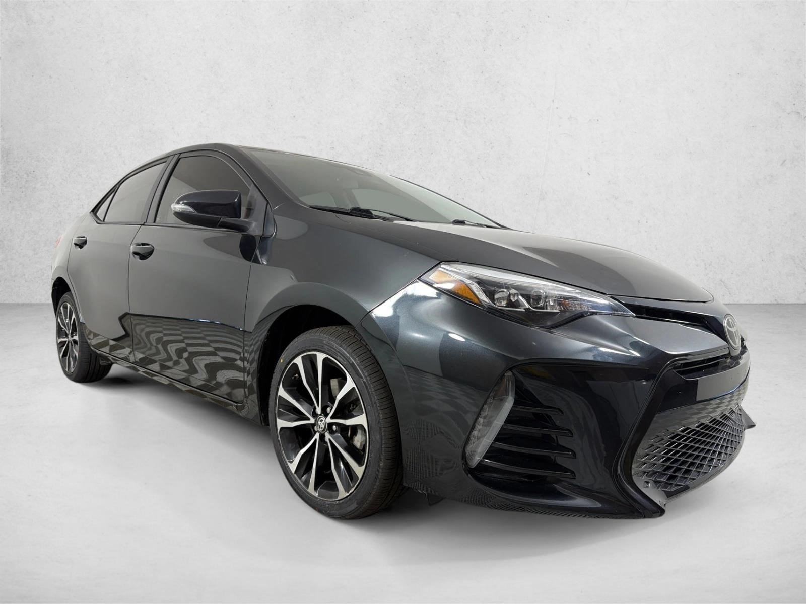 Used 2018 Black Sand Pearl Toyota SE image 1