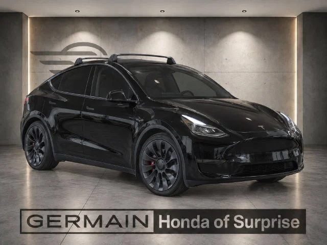 Used 2023 Solid Black Tesla Performance image 8