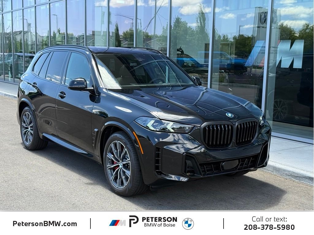 New 2026 Black Sapphire Metallic BMW xDrive50e image 7