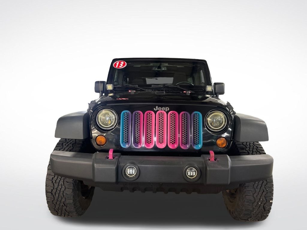 Used 2013 Black Jeep Unlimited Sport image 9