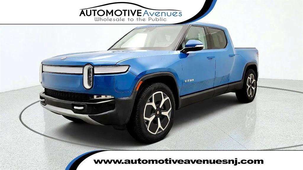 Used 2024 Rivian Blue Rivian Adventure Dual-Motor Large Pack w/ Ocean Coast Vegan Leather image 1