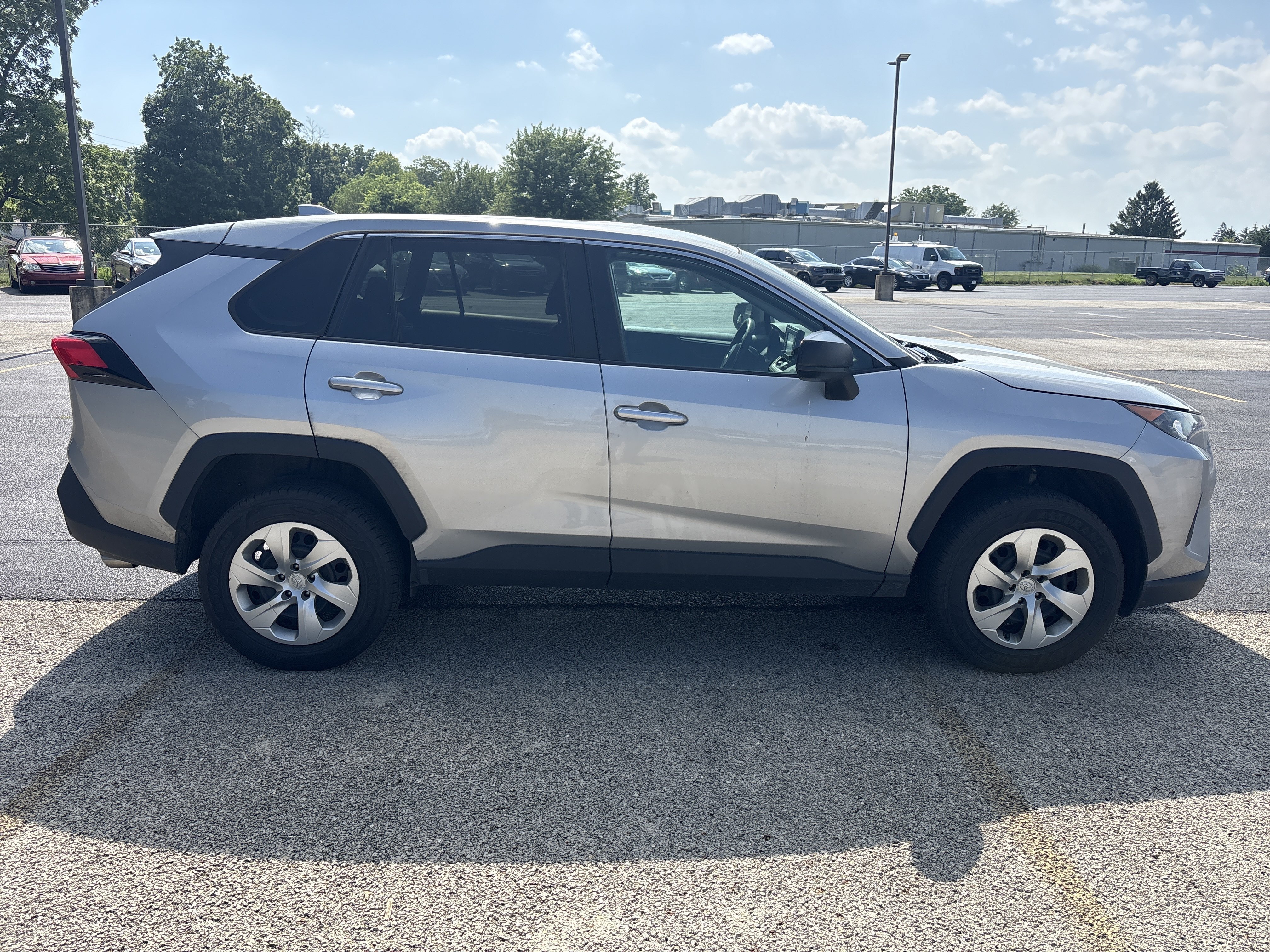 Used 2022 Silver Sky Metallic Toyota LE image 3