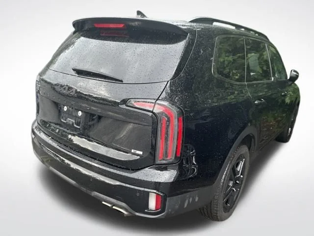 Used 2025 Black Kia EX X-Line image 6