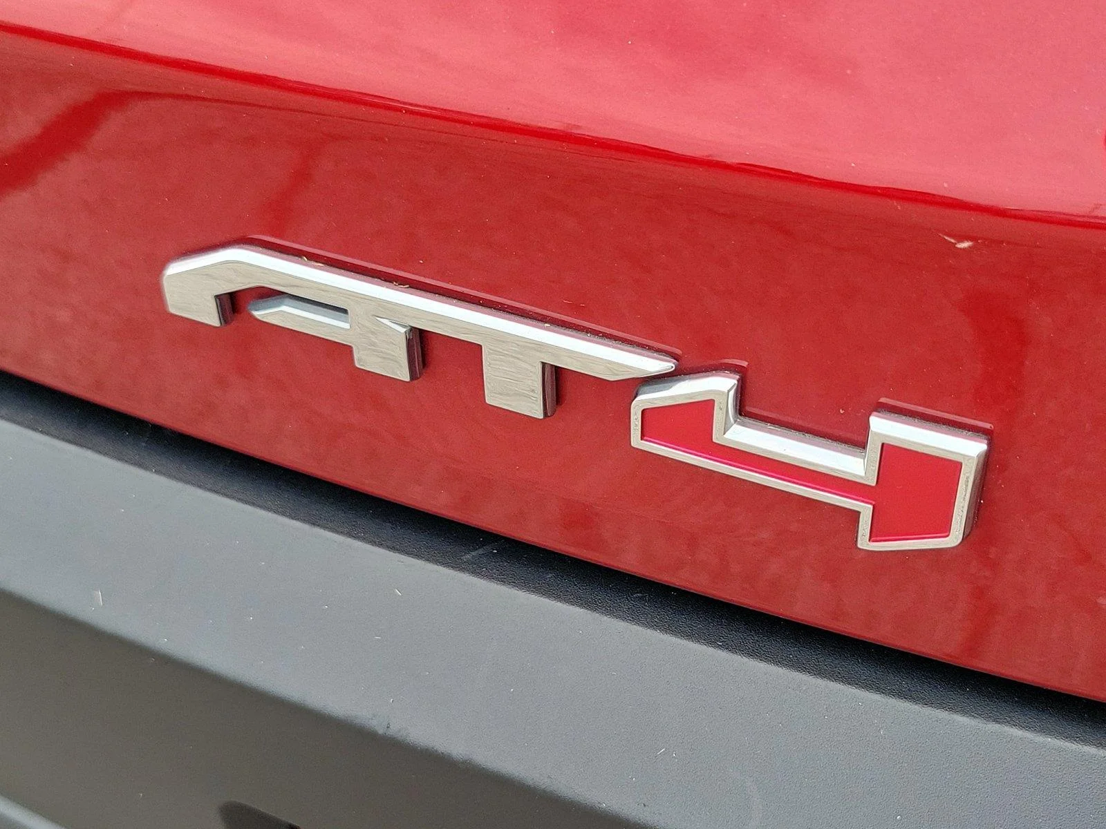 Used 2023 VOLCANIC RED TINTCOAT GMC AT4 image 7