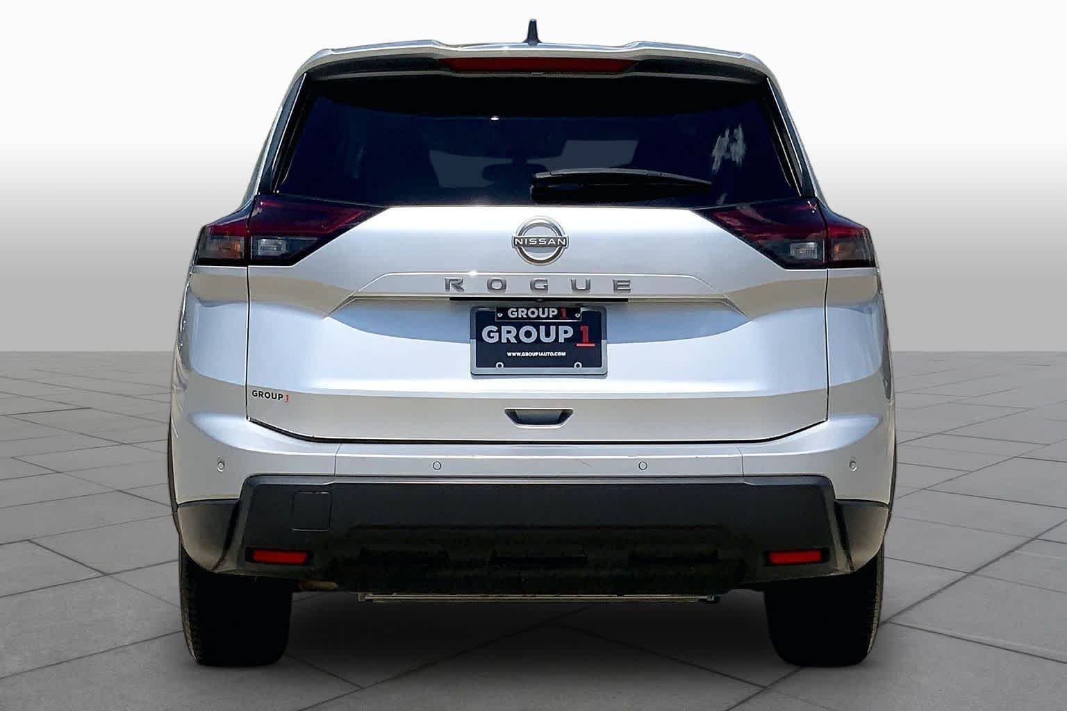 Used 2024 Brilliant Silver Metallic Nissan S image 5