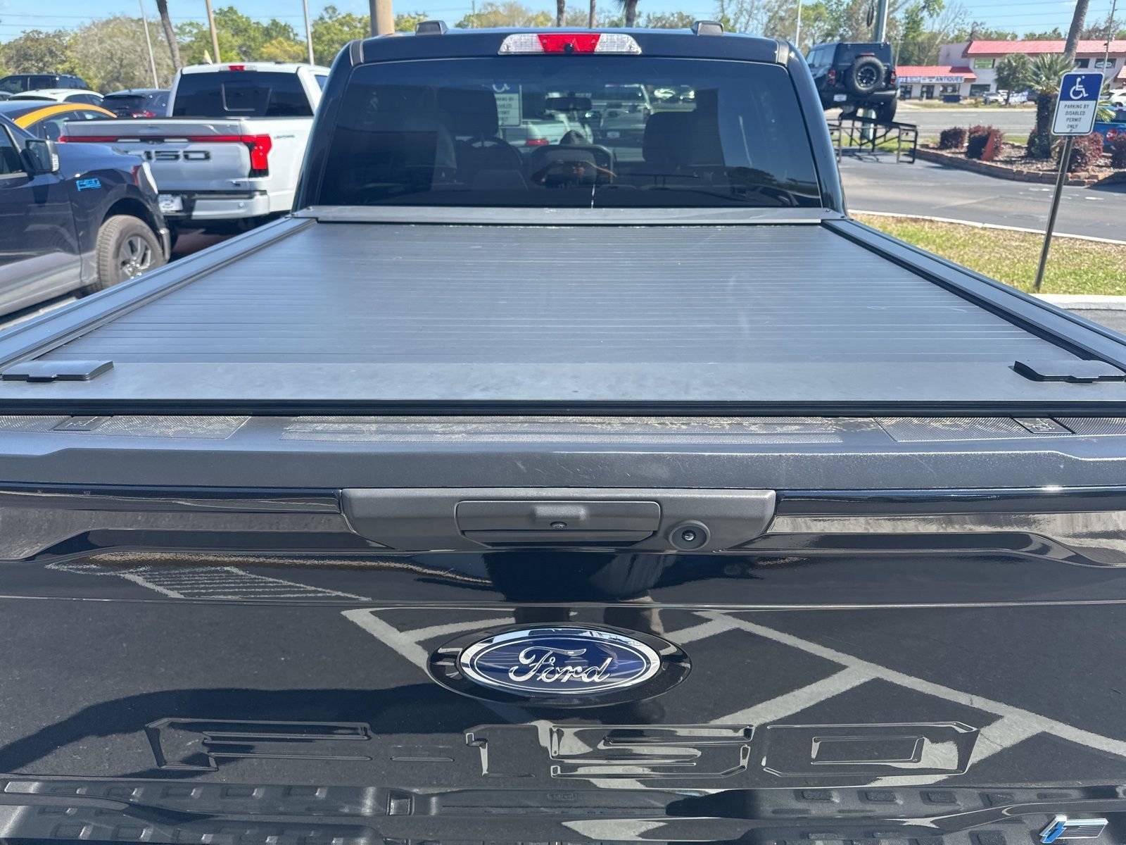 Used 2023 Ford F-150 Lightning XLT with VIN 1FTVW1EL9PWG55570 for sale in Spring Hill, FL