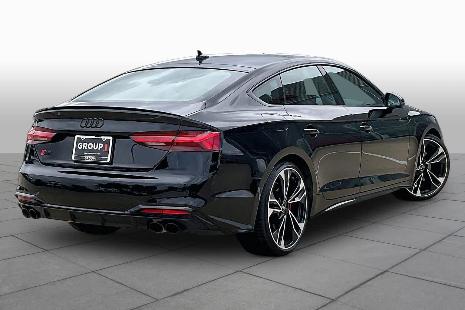 Used 2024 Mythos Black Metallic Audi Premium Plus image 12