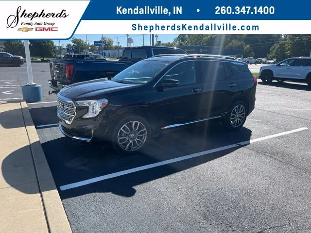 Used 2024 Ebony Twilight Metallic GMC Denali image 1
