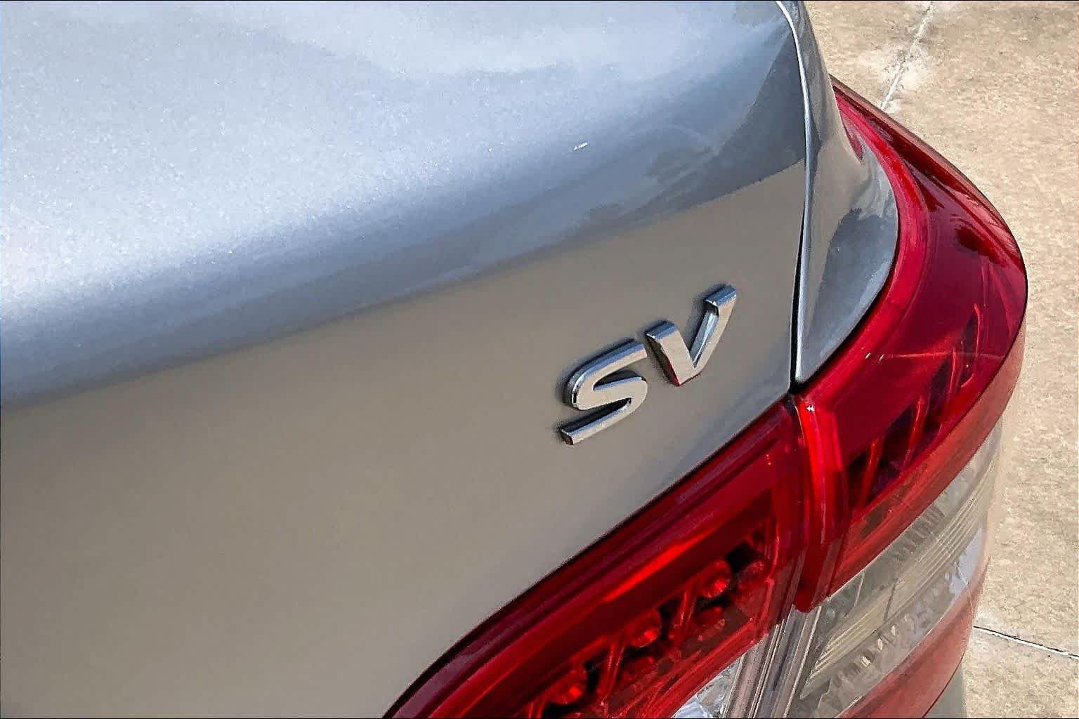 Used 2014 Brilliant Silver Nissan SV image 10