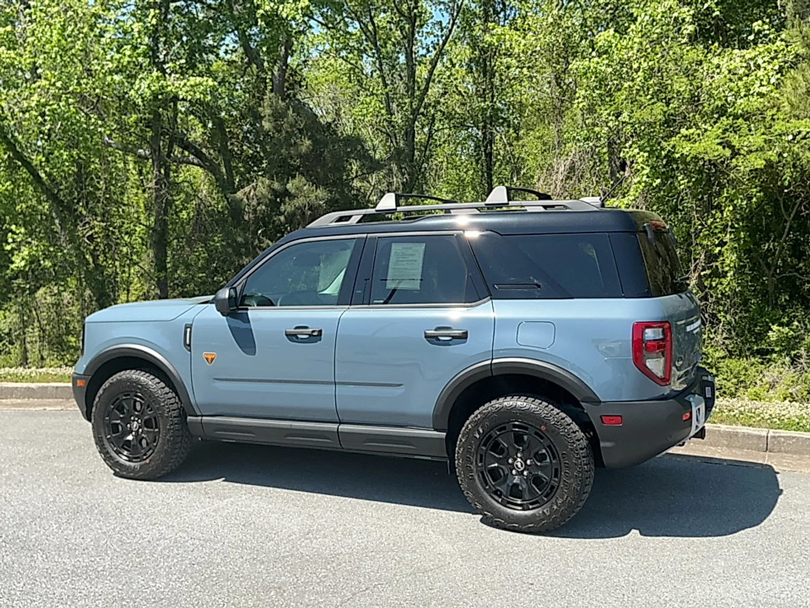 Used 2025 Azure Gray Metallic Tri-Coat Ford Badlands image 3