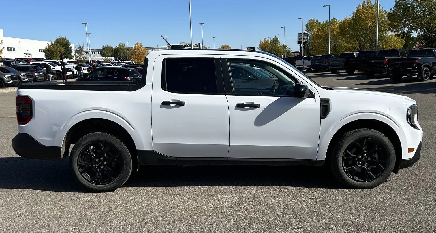 Used 2025 White Ford XLT SuperCrew   AWD image 6