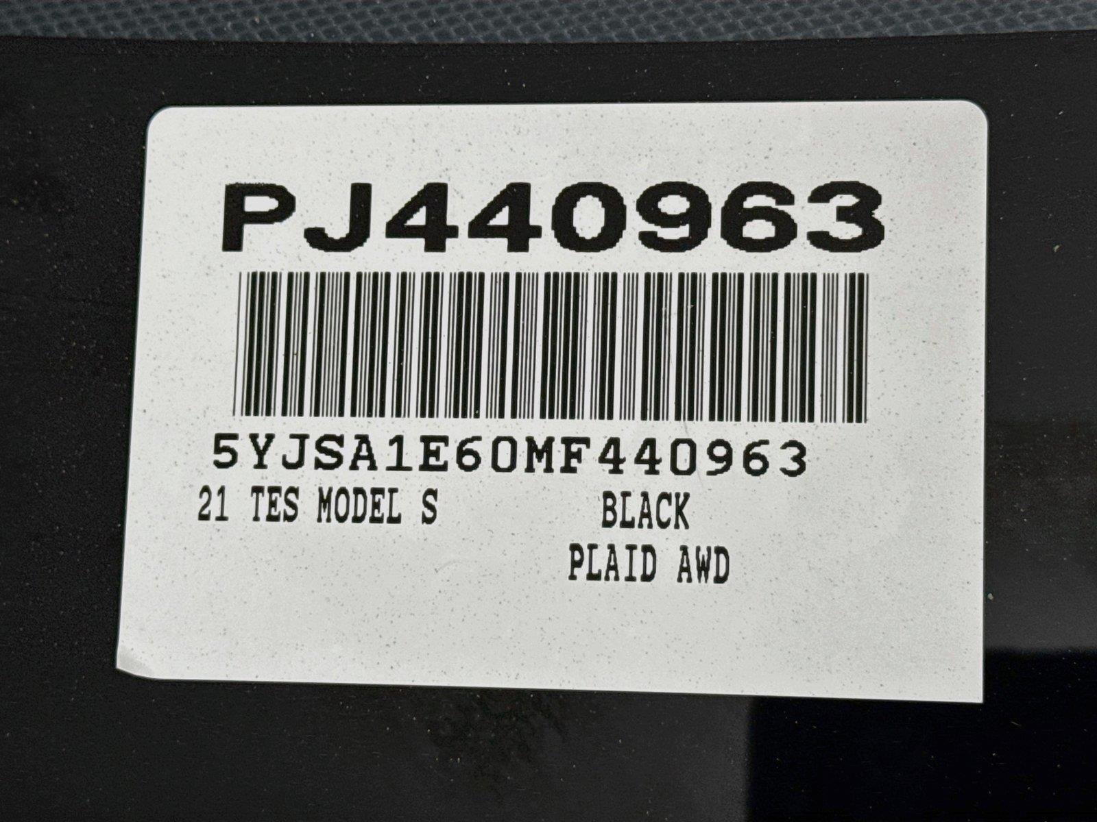 Used 2021 Solid Black Tesla Plaid image 40